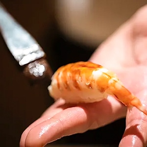 寿司を炙るイメージ